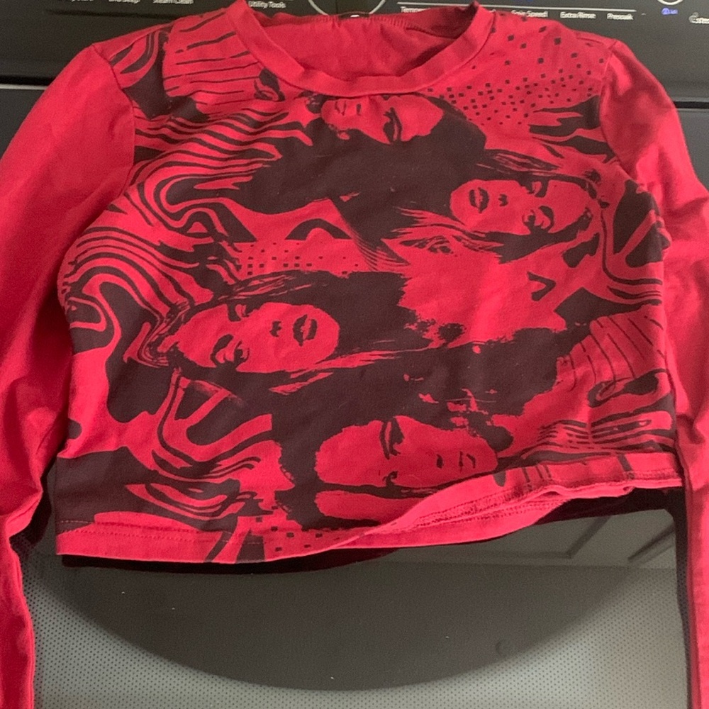Red top with faces